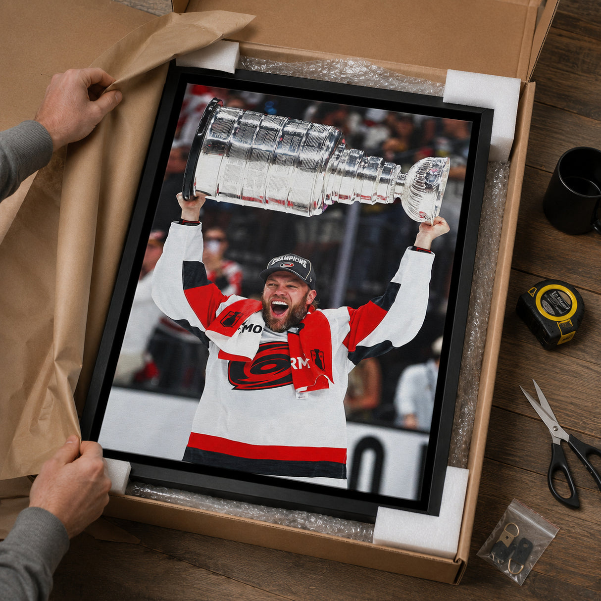 Taylor Hall 20x29 Framed Canvas Carolina Hurricanes 2026 Stanley Cup Champions - unboxing lifestyle image