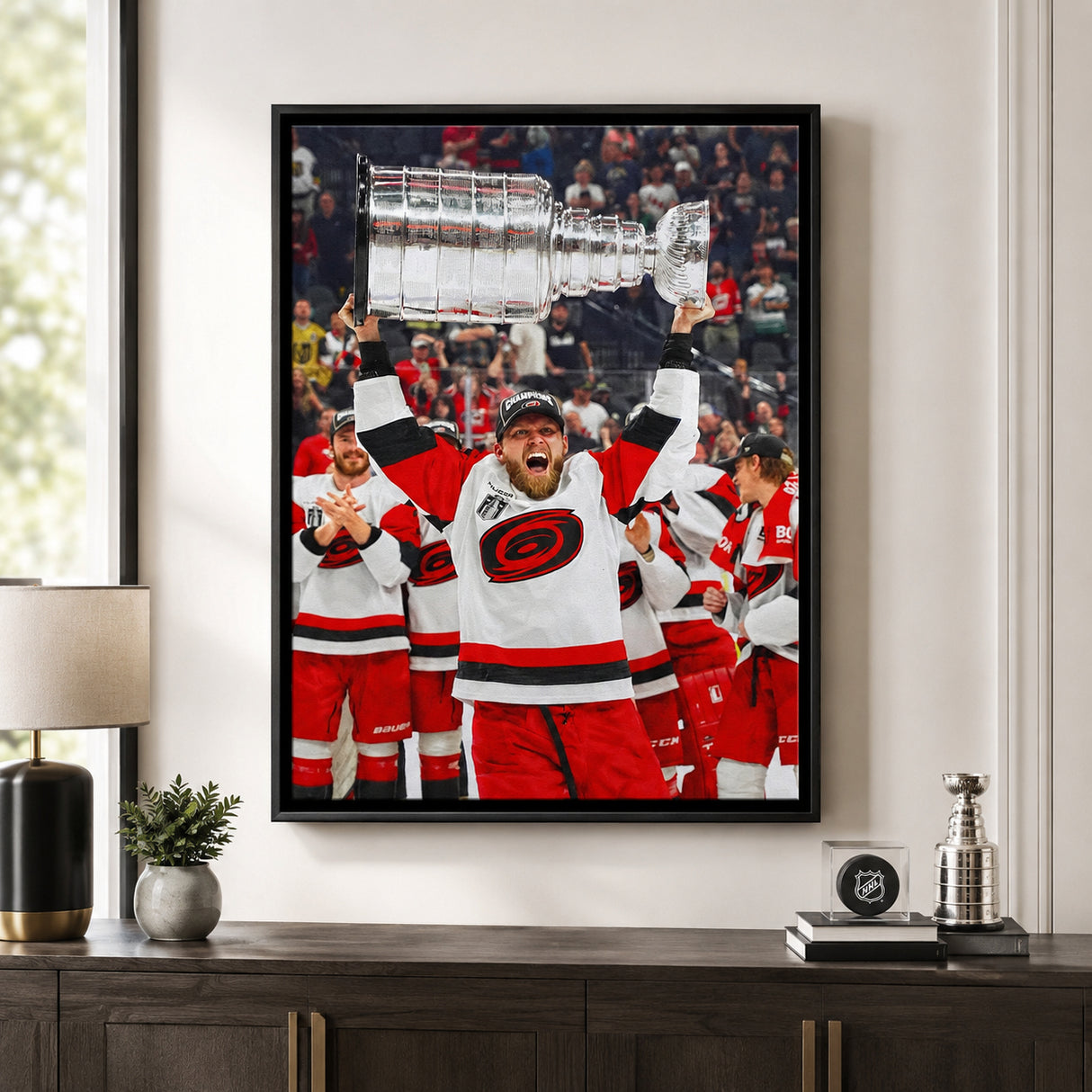 Nikolaj Ehlers 20x29 Framed Canvas Carolina Hurricanes 2026 Stanley Cup Champions - room wall lifestyle image