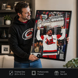 Seth Jarvis 20x29 Framed Canvas Carolina Hurricanes 2026 Stanley Cup Champions - collector holding framed canvas image