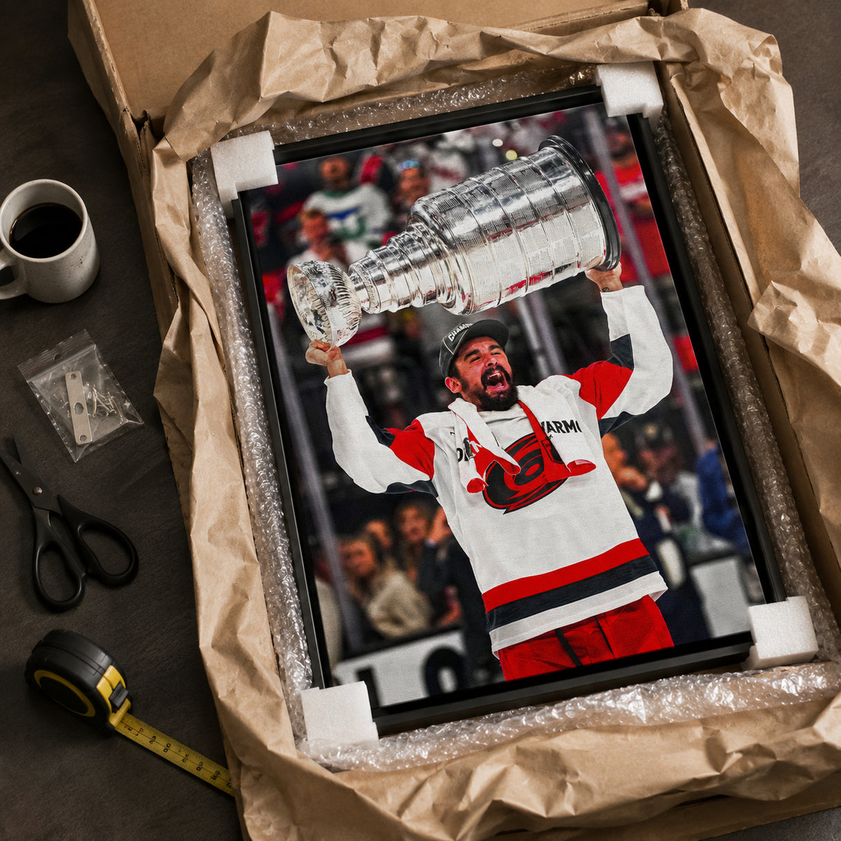 Seth Jarvis 20x29 Framed Canvas Carolina Hurricanes 2026 Stanley Cup Champions - unboxing lifestyle image