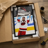 Jordan Staal 20x29 Framed Canvas Carolina Hurricanes 2026 Stanley Cup Champion - unboxing lifestyle image
