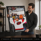 Frederik Andersen 20x29 Framed Canvas Carolina Hurricanes 2026 Stanley Cup Champions - collector holding framed canvas image