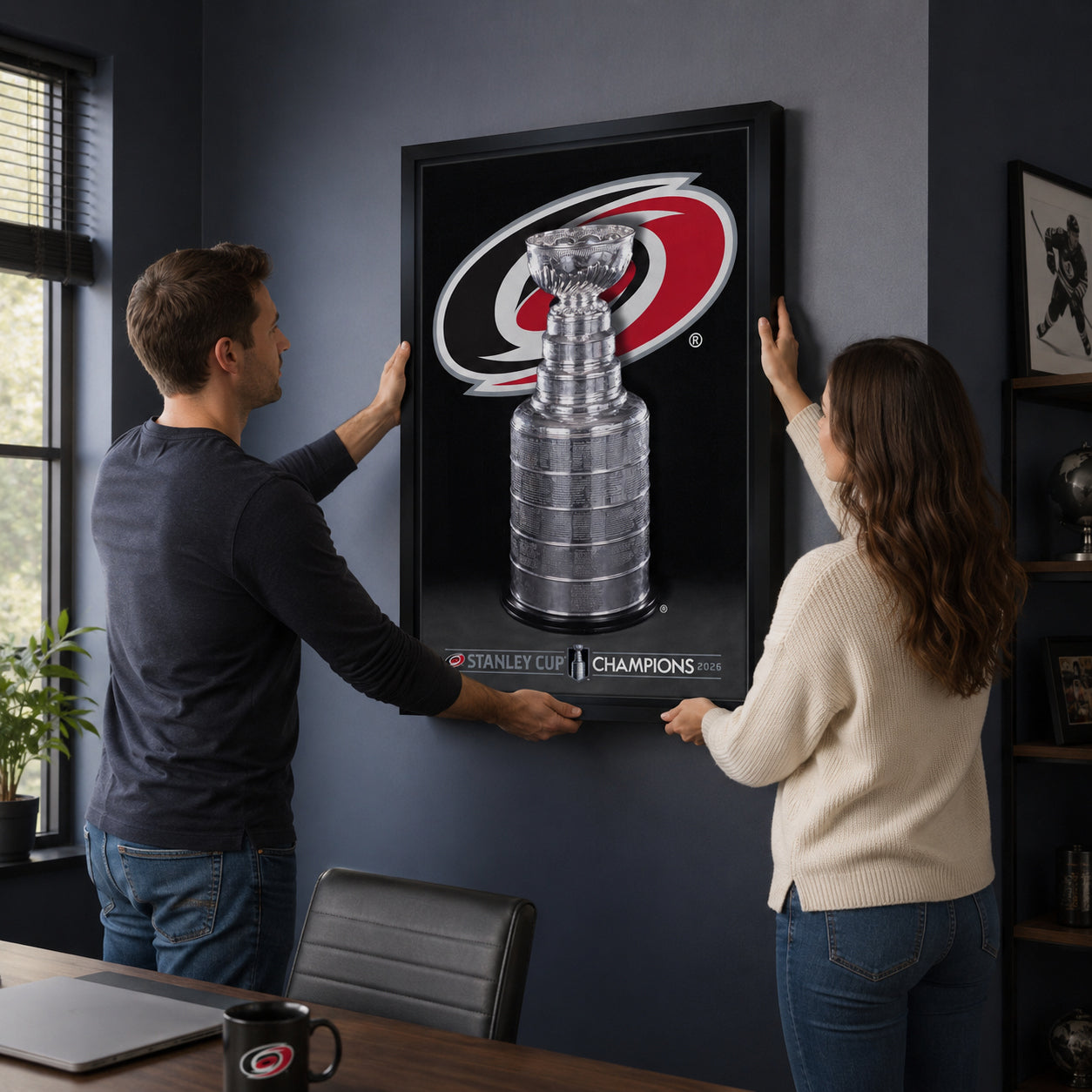 Carolina Hurricanes 20x29 Framed Canvas 2026 Stanley Cup Champions - hanging installation lifestyle image