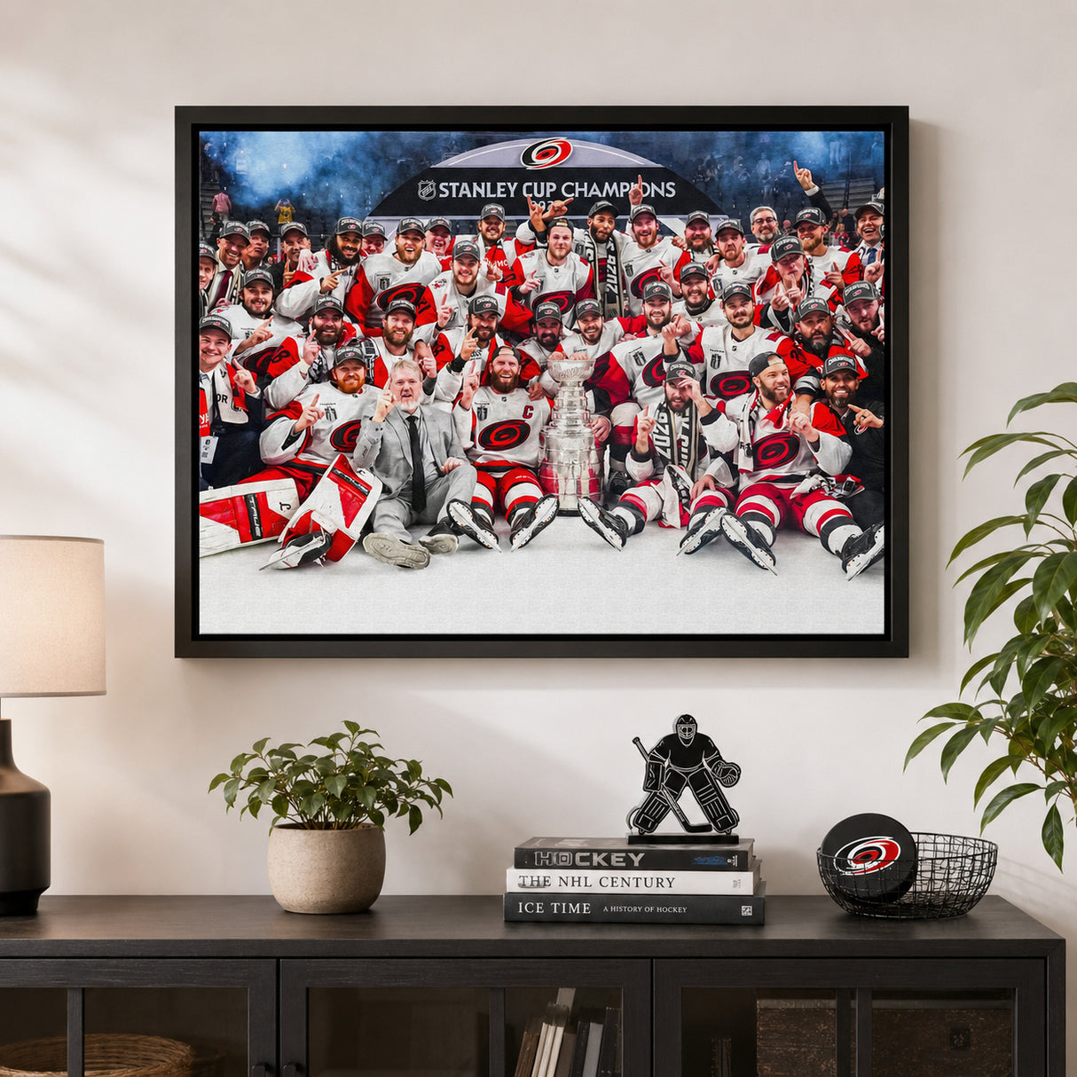 Carolina Hurricanes 20x29 Framed Canvas Celebration 2026 Stanley Cup Champions - room wall lifestyle image