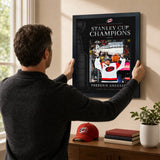 Frederik Andersen 16x20 PhotoGlass frame Carolina Hurricanes 2026 Stanley Cup Champions shown being hung as framed wall art