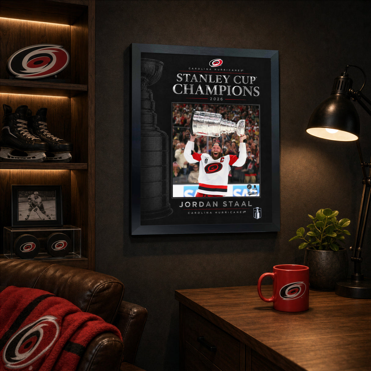 Jordan Staal 16x20 PhotoGlass frame Carolina Hurricanes 2026 Stanley Cup Champions displayed in a fan room