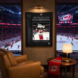 Nikolaj Ehlers 16x20 PhotoGlass Frame Carolina Hurricanes 2026 Stanley Cup Champions displayed in a hockey fan room