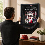 Seth Jarvis 16x20 PhotoGlass frame Carolina Hurricanes 2026 Stanley Cup Champions shown being hung as framed wall art