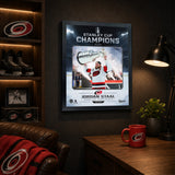 Jordan Staal Ice Design 16x20 PhotoGlass frame Carolina Hurricanes 2026 Stanley Cup Champions displayed in a fan room