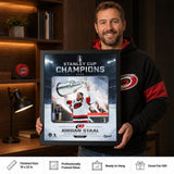 Jordan Staal 16x20 PhotoGlass Frame Carolina Hurricanes 2026 Stanley Cup Champions Ice Design held as framed Carolina Hurricanes wall art