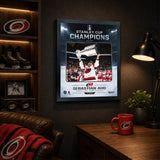 Sebastian Aho Ice Design 16x20 PhotoGlass frame Carolina Hurricanes 2026 Stanley Cup Champions displayed in a fan room