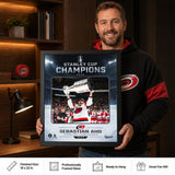 Sebastian Aho 16x20 PhotoGlass Frame Carolina Hurricanes 2026 Stanley Cup Champions Ice Design held as framed Carolina Hurricanes wall art