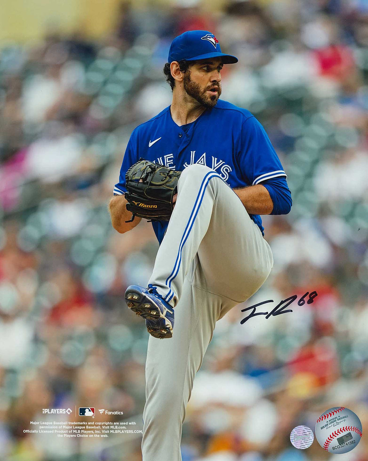 Jordan Romano Signed 8x10 Unframed Toronto Blue Jays Blue Wind Up Photo