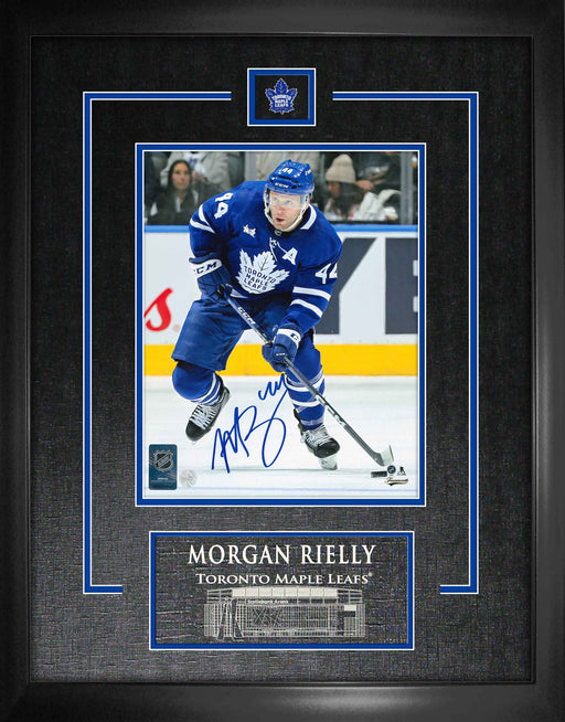 Morgan Rielly Signed Framed Toronto Maple Leafs Blue Carrying Puck 8x10 Photo - Frameworth Sports Canada 