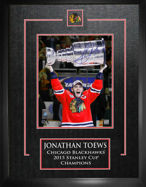 Jonathan Toews Chicago Blackhawks Signed Framed 8x10 Raising the 2015 Stanley Cup Photo - Frameworth Sports Canada 