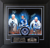 Frame with blue double matting, skyline photo composition, and mounted puck creating balanced layout