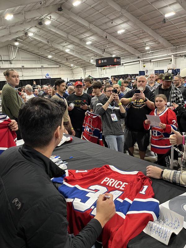 Carey Price signing a jersey at Frameworth's public signing, Toronto Sport Card Expo 2023
