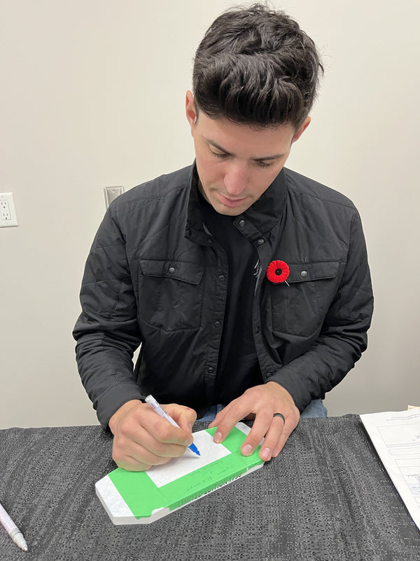 Carey Price signing an item, Toronto Sport Card Expo 2023