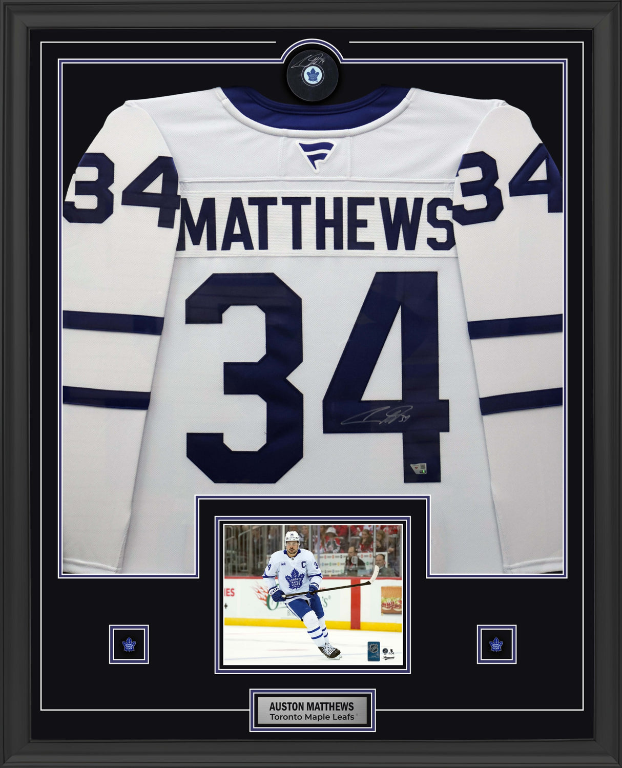 Auston Matthews Signed Toronto Maple Leafs framed 34x42 Away Fanatics Premium Jersey with Signed Puck - AUCTION