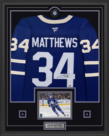 Auston Matthews Signed Toronto Maple Leafs Framed 34x42 Home Fanatics Premium Jersey with Signed Puck - AUCTION